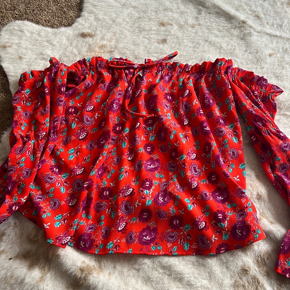 Off the shoulder red shirt